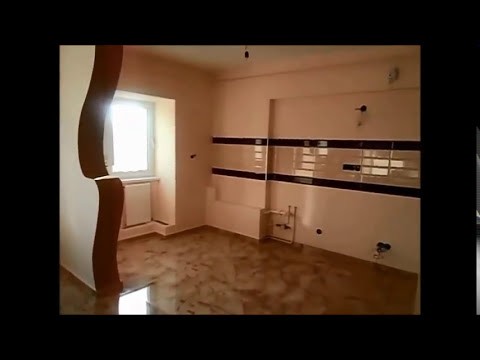 Apartament renovat imagini living bucatarie antreu si hol cu gresie marmorata.amenajari  interioare